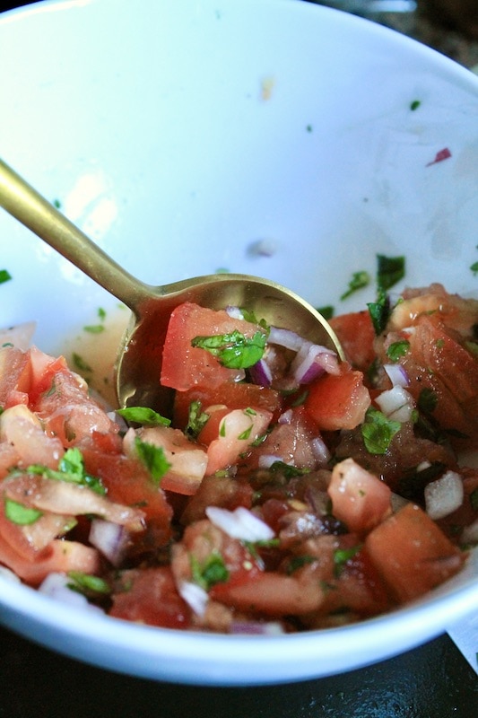 spoon salsa mix over the guacamole mix