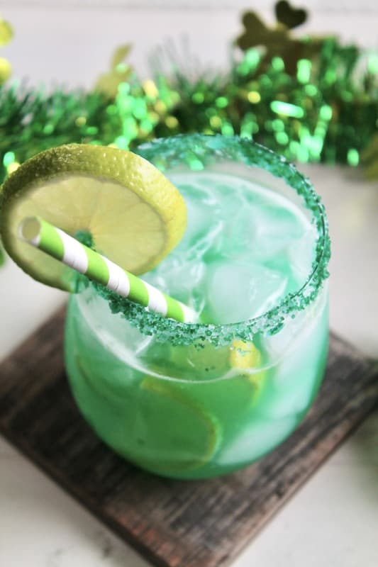in a cocktail shaker splash in irish whiskey, tequila