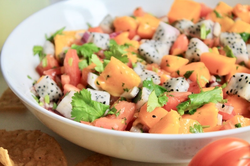 mix together cubed dragon fruit mango tomato red onion and cilantro and lime juice to toss together into salsa