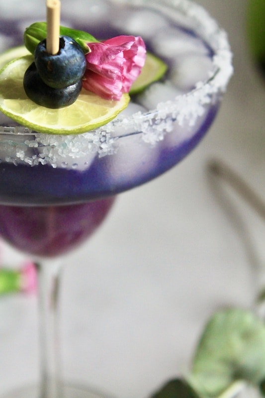dip your margarita glasses in salt and set aside. 