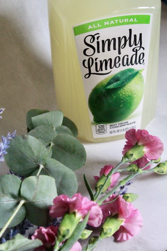 splash in simply limeade juice plus silver tequila and blue curaçao and fresh lime juice from a wedge of lime