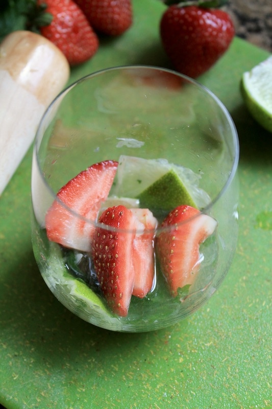 add strawberry chunks and muddle once more