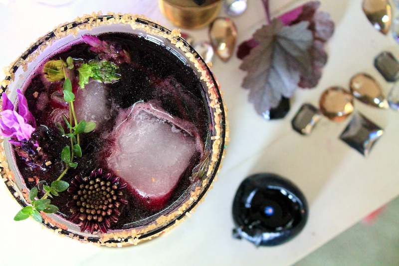 add berry preserves, lemon, wine, and rum to cocktail shaker