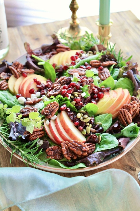 top with sliced red apple