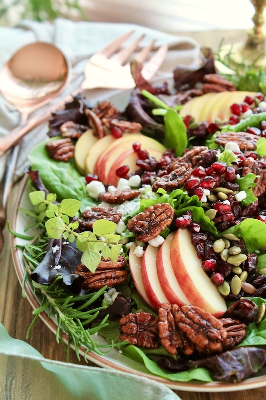 top with caramelized pecans and goat cheese crumbles