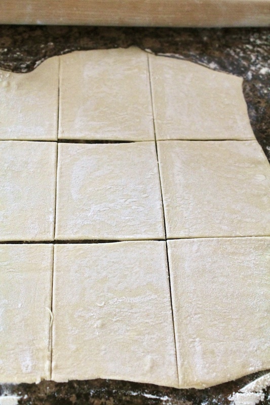 top each puff pastry square with apple filling