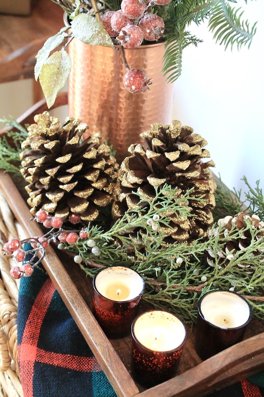 easy christmas floral arrangement with fresh pine and artificial frosty branches. 