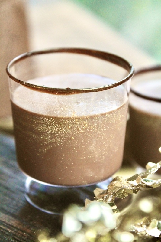 in a shaker combine chocolate sauce vanilla cinnamon rum coffee vanilla ice cream and shake well until combined