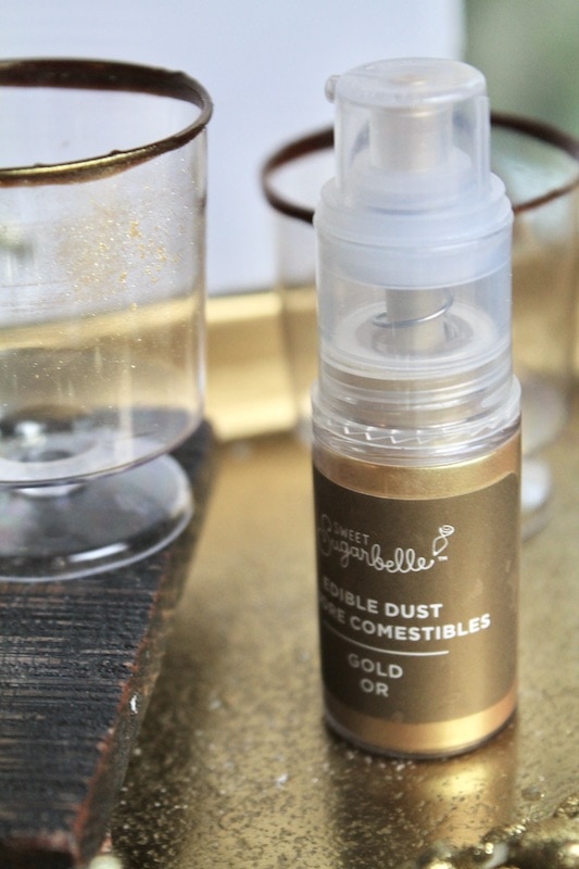 spray glasses with gold dust