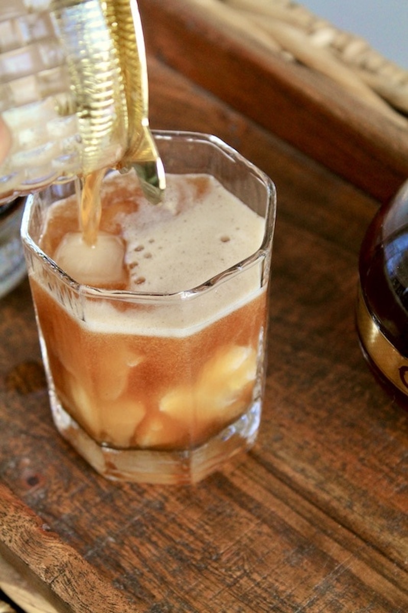 add vodka cover and shake until frothy and pour