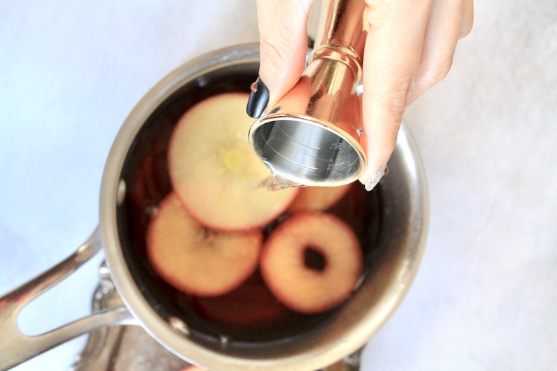 add water apples juice and tea to pot and heat