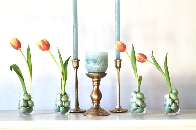 use these easter decoration ideas to decorate a fireplace mantel, a dining room table, or a console table