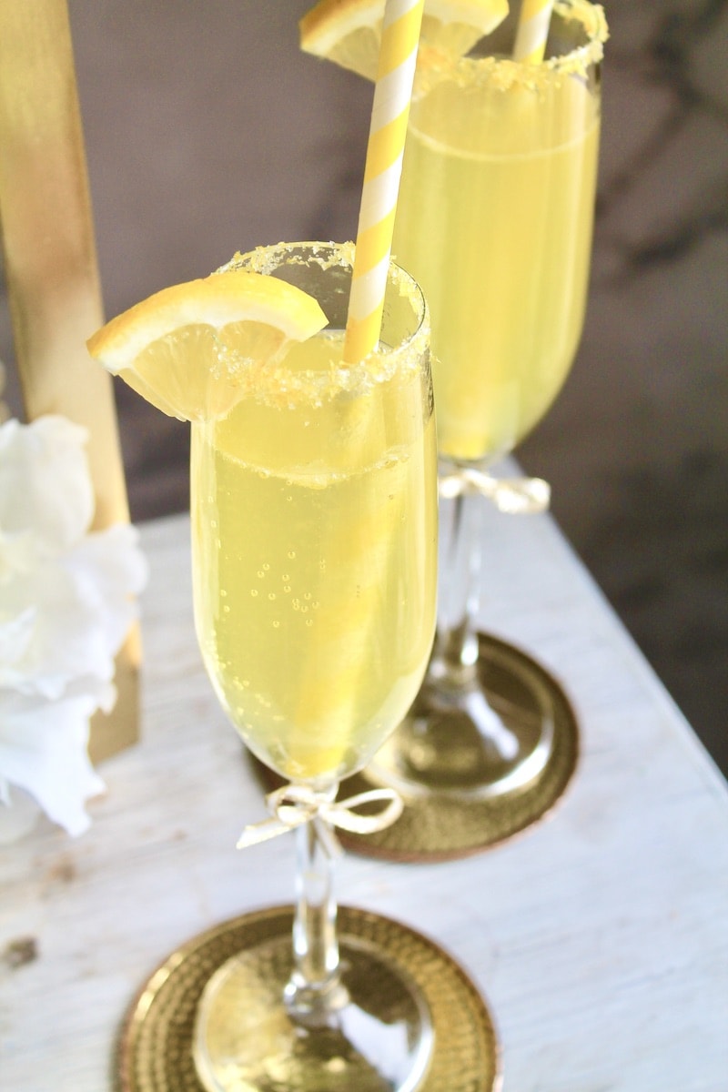 combine fresh lemon juice with simple syrup and elderflower liqueur and stir
