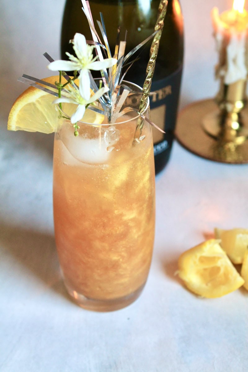 splash in simple syrup lemon juice chambord and cranberry juice