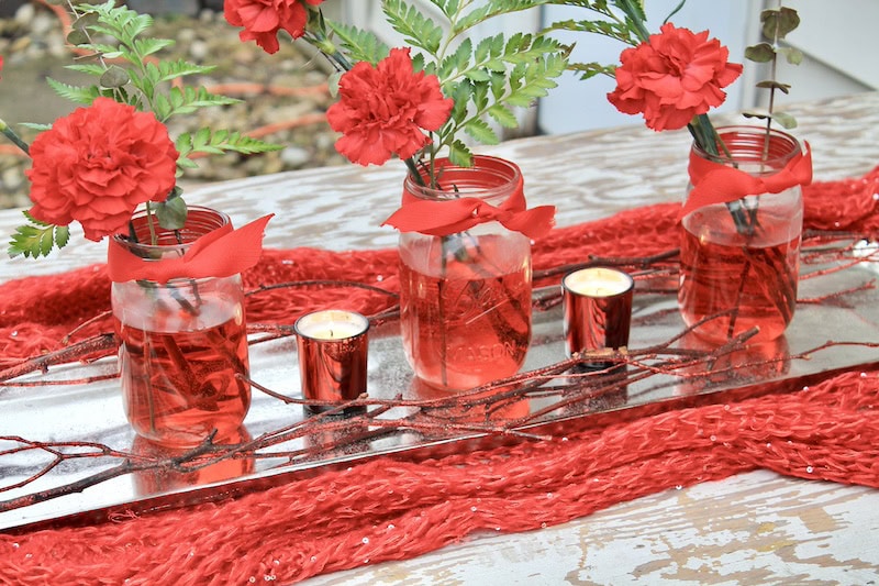 red flower arrangement valentines day table ideas