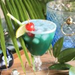 pineapple rum drink with blue curacao