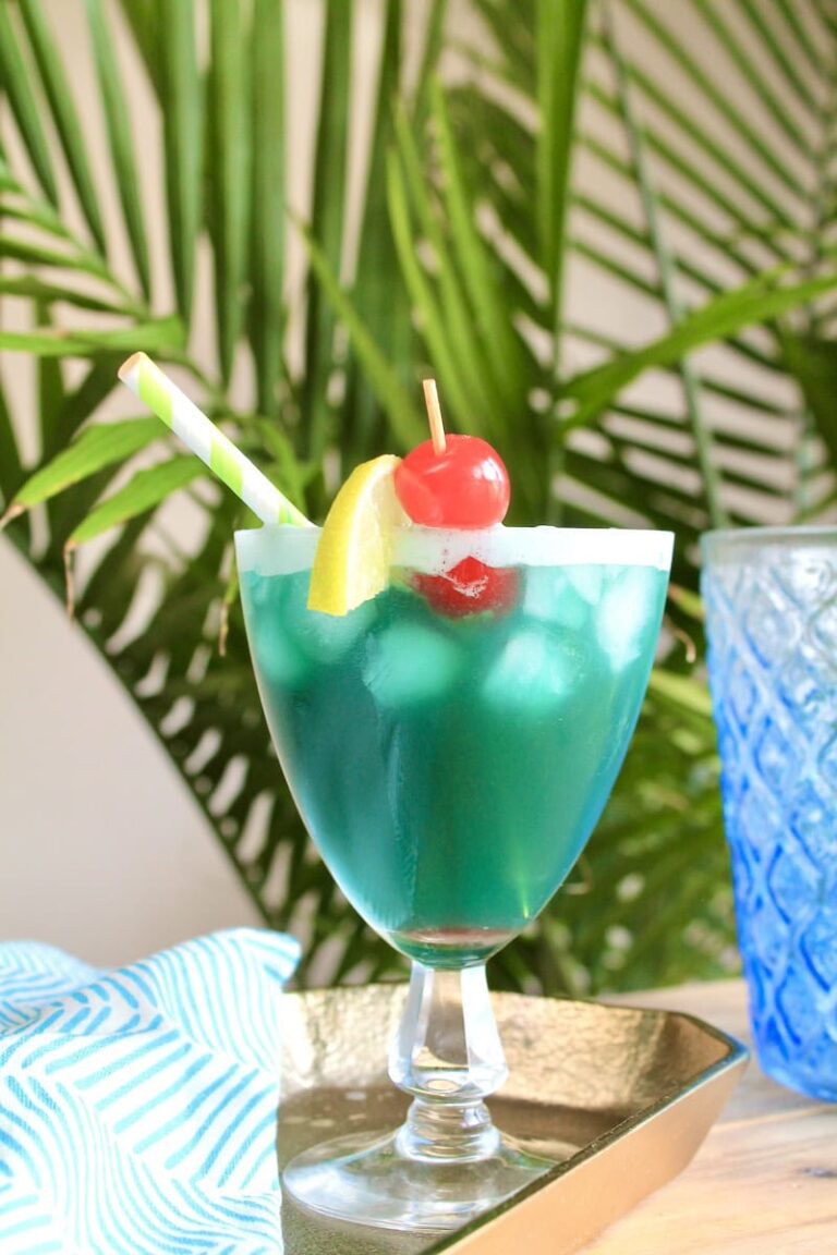 fresh pineapple rum drink with blue curacao