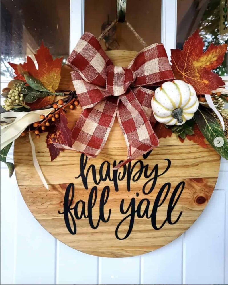 easy fall front door decor with pumpkins and ribbon