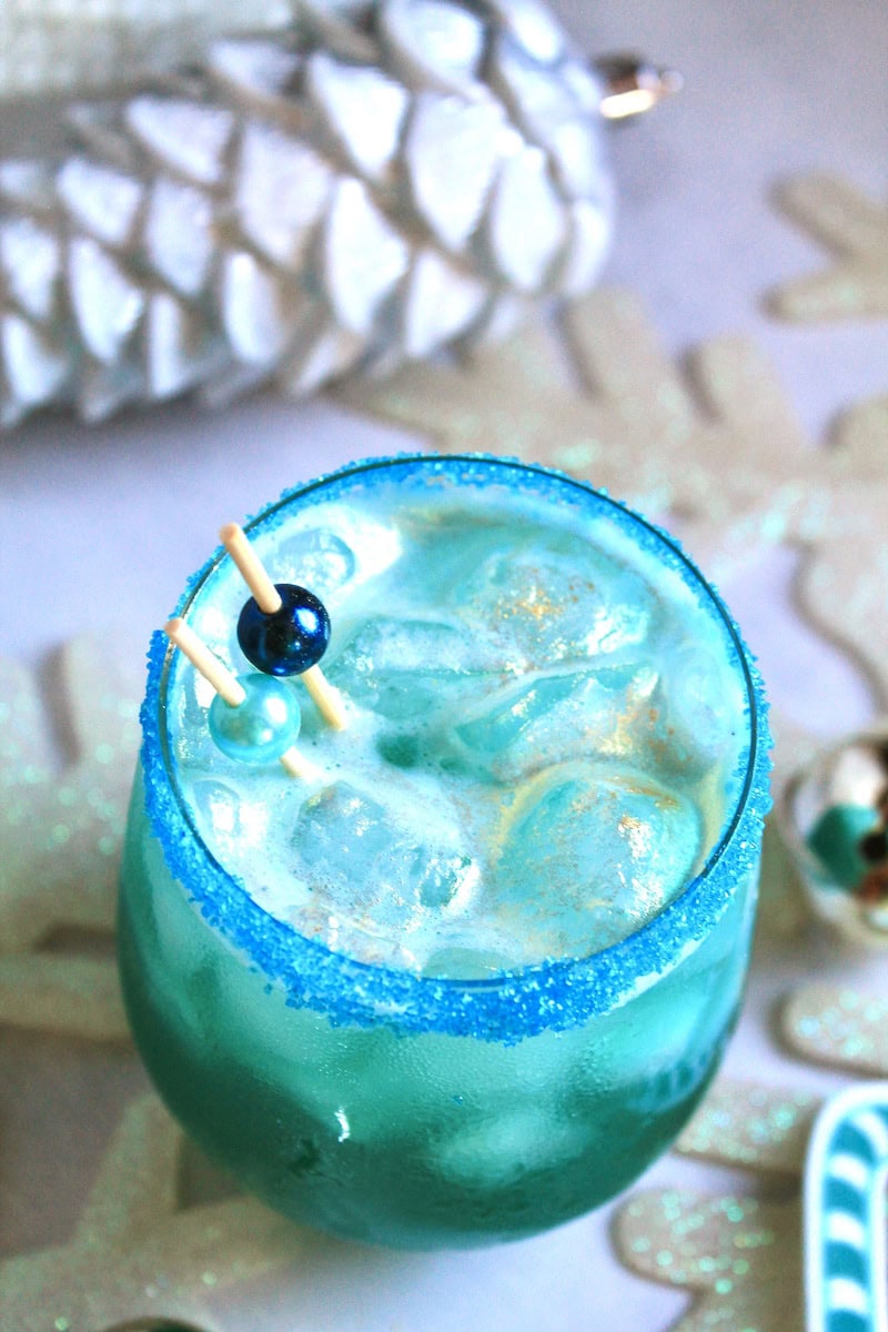 winter themed cocktail with blue curacao